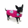 Dog wearing pink outfit with bow