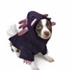 Dog wearing purple axolotl costume plain background