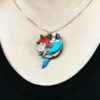 Person wearing Budgie parrot necklace close up