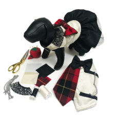 Dog dress with tartan bow and production materials